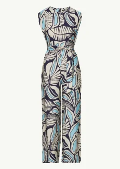 Gemusterter Overall mit Bindegürtel und Faltendetails