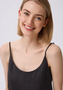 Top aus schimmerndem Jersey-Piqué